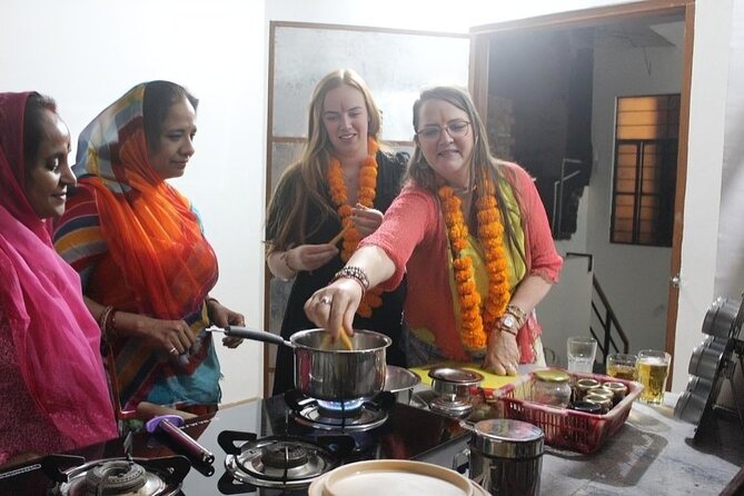Authentic Traditional Family Cooking class in a Great Ambiance - The rooftop-style ambience and open-air cooking factor