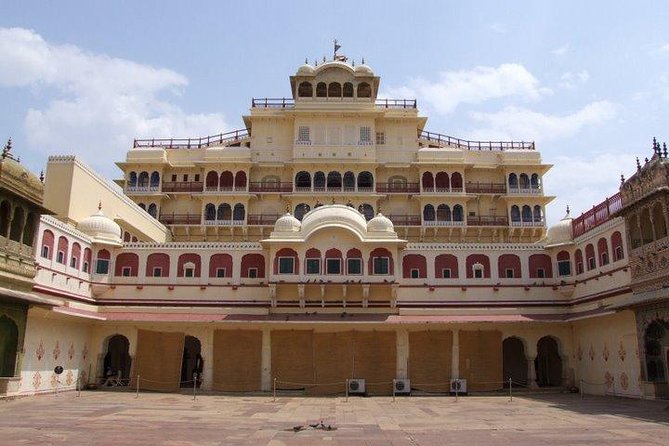 Jaipur Full Day City Tour visit Hawa Mahal, Amber Fort & City Palace - Jal Mahal Photo Stop at Man Sarobar Lake: When the Lake Looks Different